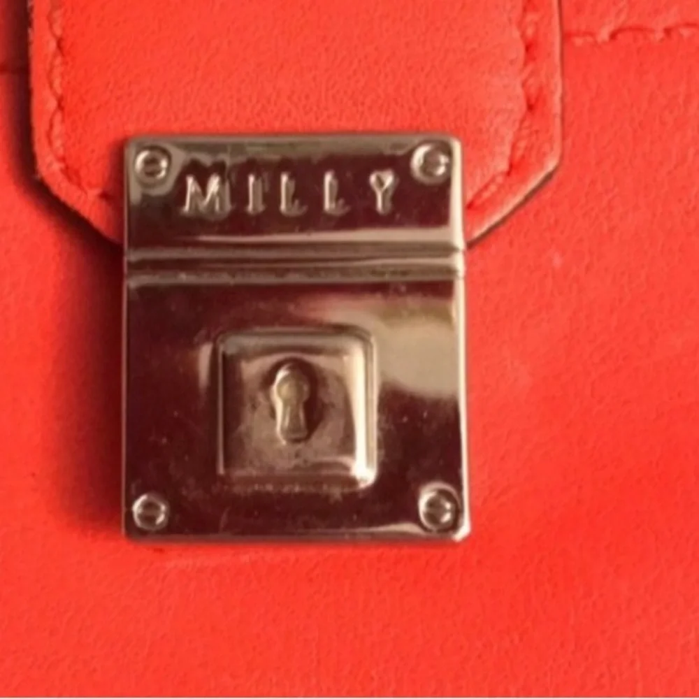 Milly wristlet orange mobile wallet front snap ,zip  lots of pockets